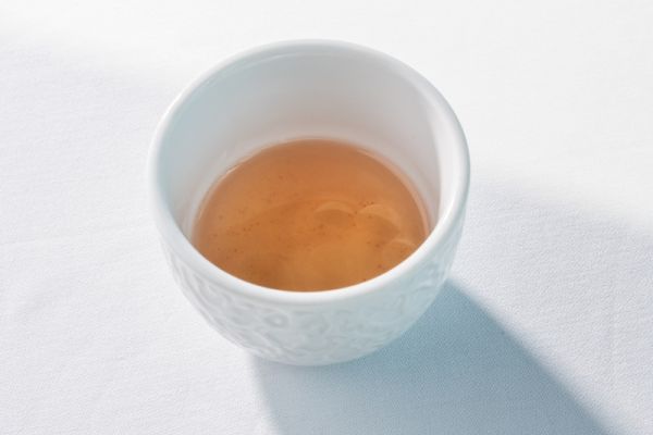 TOMATO ESSENCE WITH STRAWBERRY, PLUM VINEGAR, AND COFFEE OIL